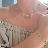 Set de Pulsera y cadena cruz y ojito turko